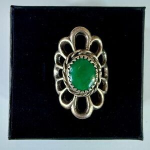 Vintage Navajo sandcast silver ring with green stone